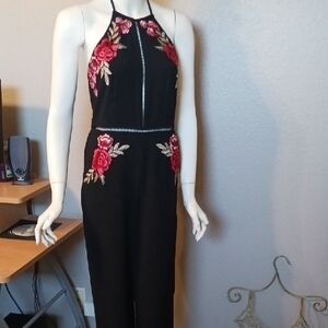 Gianni Bini Black Jumpsuit with Red Floral Design